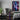 Aesthetic night city wall decor, in a gaming room. UV Inks combined with acrylic glass, deliver 80% more clarity compared to other methods ensuring vibrant colors.