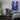 Blue Japanese canvas print hanging on the wall in a gaming bedroom as decor.