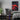 A gaming room featuring the red mountain nature wall art as wall decor.