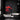 A modern room, featuring the red moon canvas wall art mounted on a black wall as wall decor.